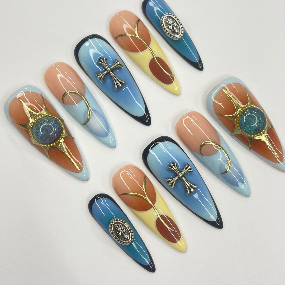 Summer Blue and Terracotta Nails with Gold-Tone Medallions