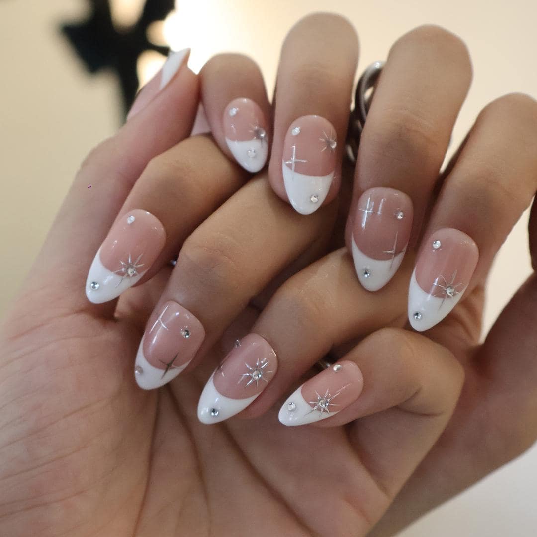 Blush Pink French Tip Nails with Silver Stars and Rhinestone Accents