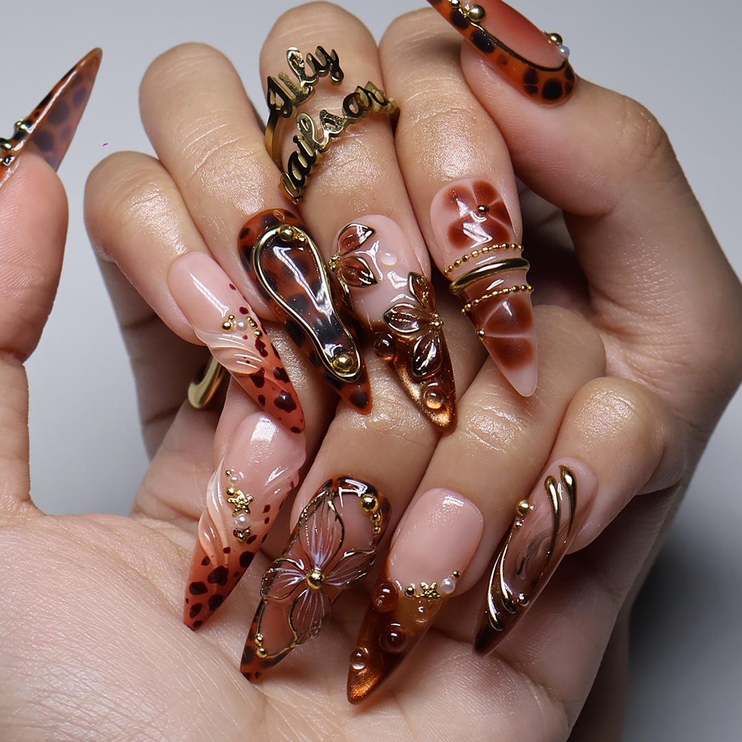 Fall Amber and Brown Tortoiseshell Floral Nails with Gold Chrome Details