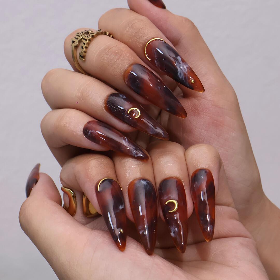 Glossy Tortoiseshell Press On Nails with Gold Crescent Accents