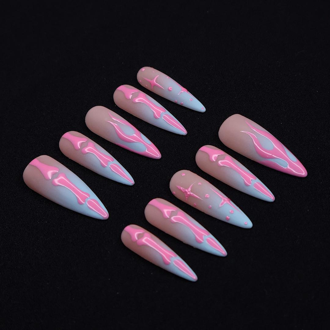 Halloween Pink Skeleton Bones and Stars on Nude Pink to Blue Ombré Nails