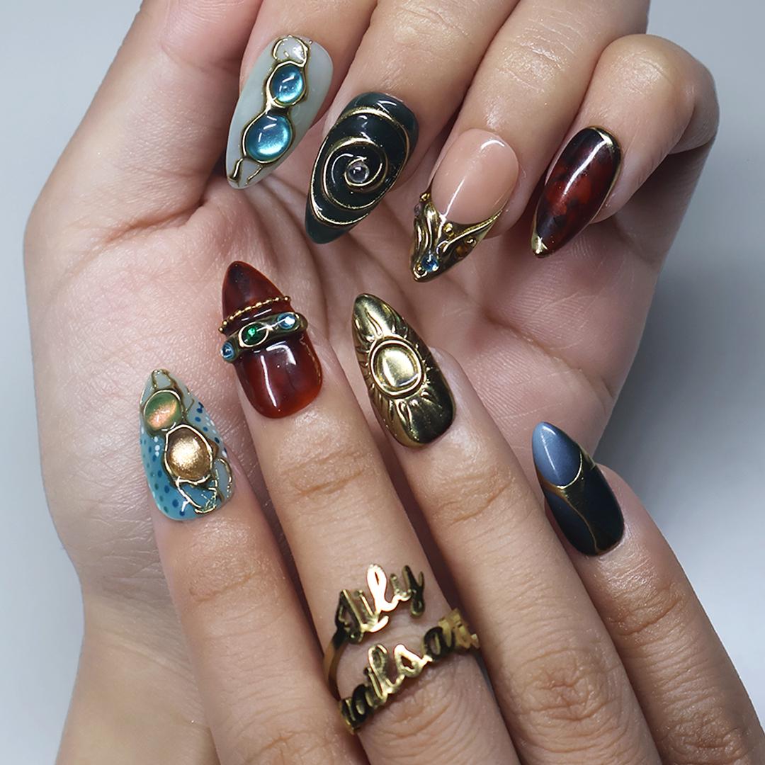 Fall Jewel-Toned Teal and Amber Nails with Gold Swirls and 3D Flower