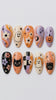 Retro Halloween Press-On Nails with Ghosts, Pumpkins, Cats, and Checkerboard