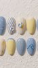 Coastal Blue and Yellow Beach Nail Set With Seashells and Wave Art
