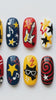 Retro Rock and Roll Pop Art Nails With Guitars, Stars and Checkerboard