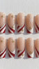 Candy Cane Stripe Christmas Nails with Silver Glitter and Gold Starbursts