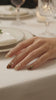 Nude Beige Press-On Nails With Gold Chrome Bangles, Tortoiseshell Tips and Green Gem Details
