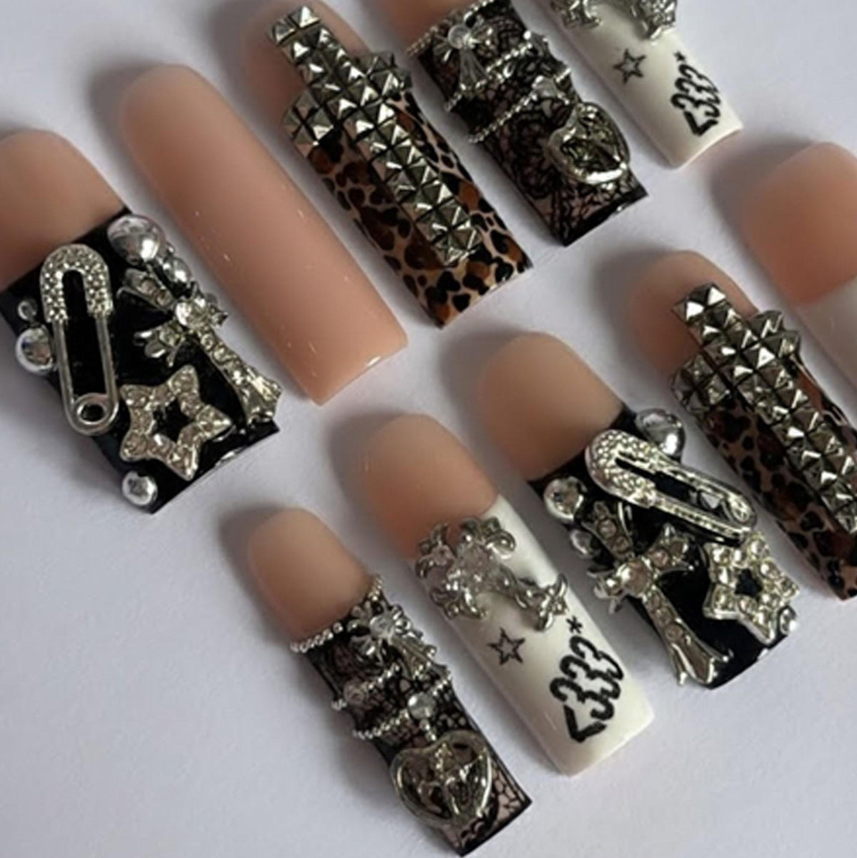 Punk-Inspired Leopard Print Nail Set With Silver-Tone Studs and Charms