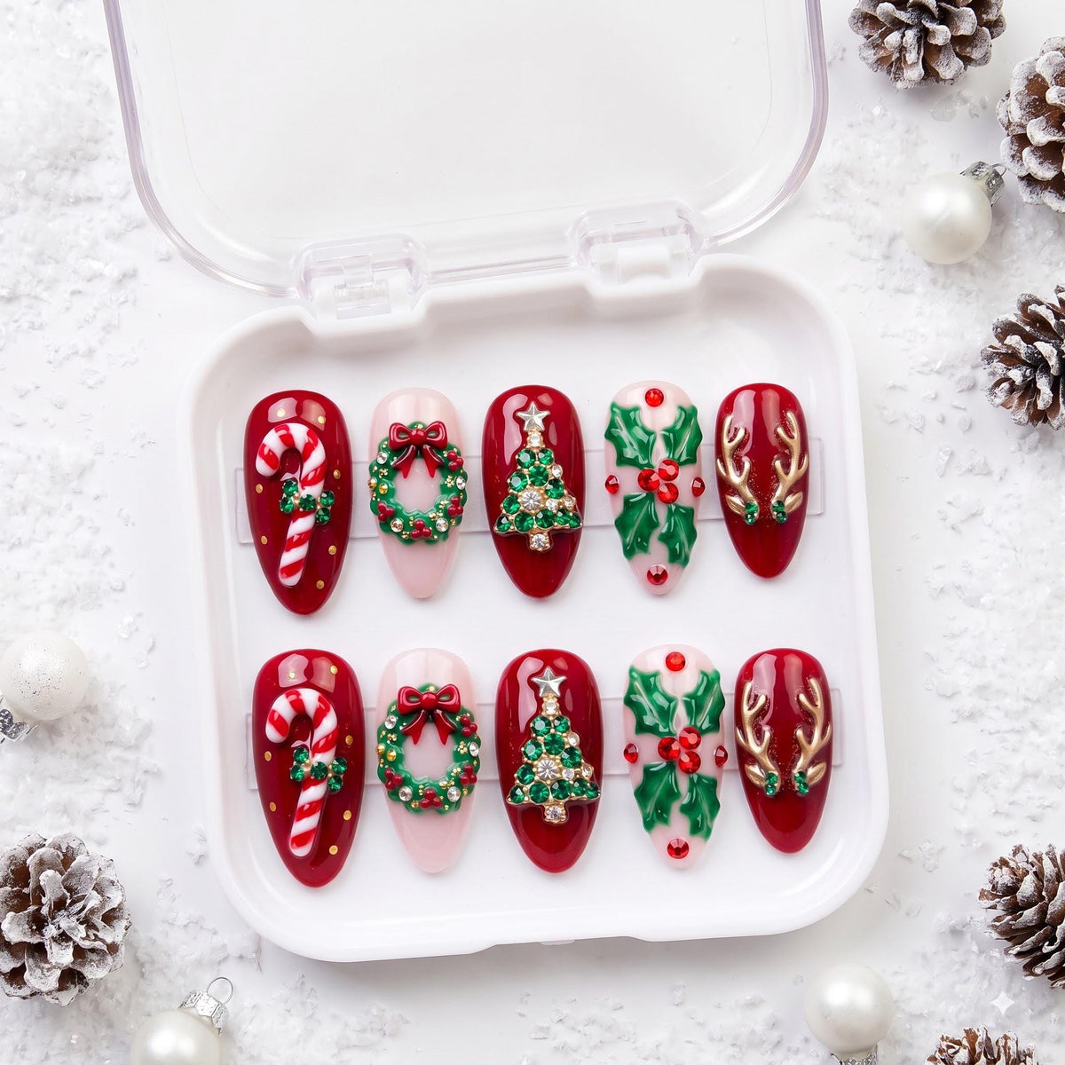Red and Pink Christmas Nails With Candy Canes, Wreaths and Reindeer Antlers