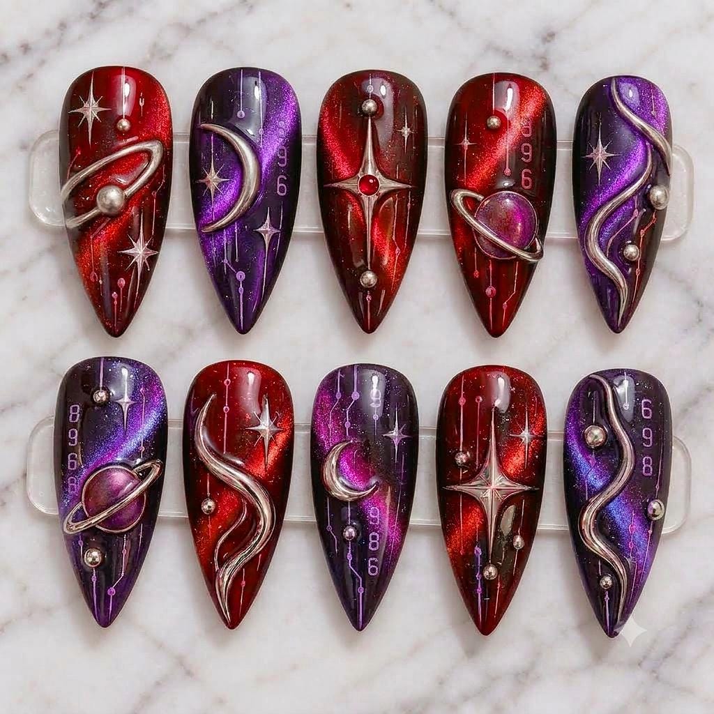 Red and Purple Galaxy Cat-Eye Nails with Silver Planet Rings and Stars