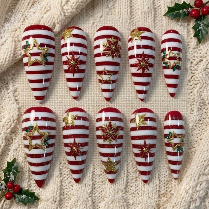 Red and White Candy Stripe Christmas Press On Nails with Gold Glitter Stars and Snowflakes