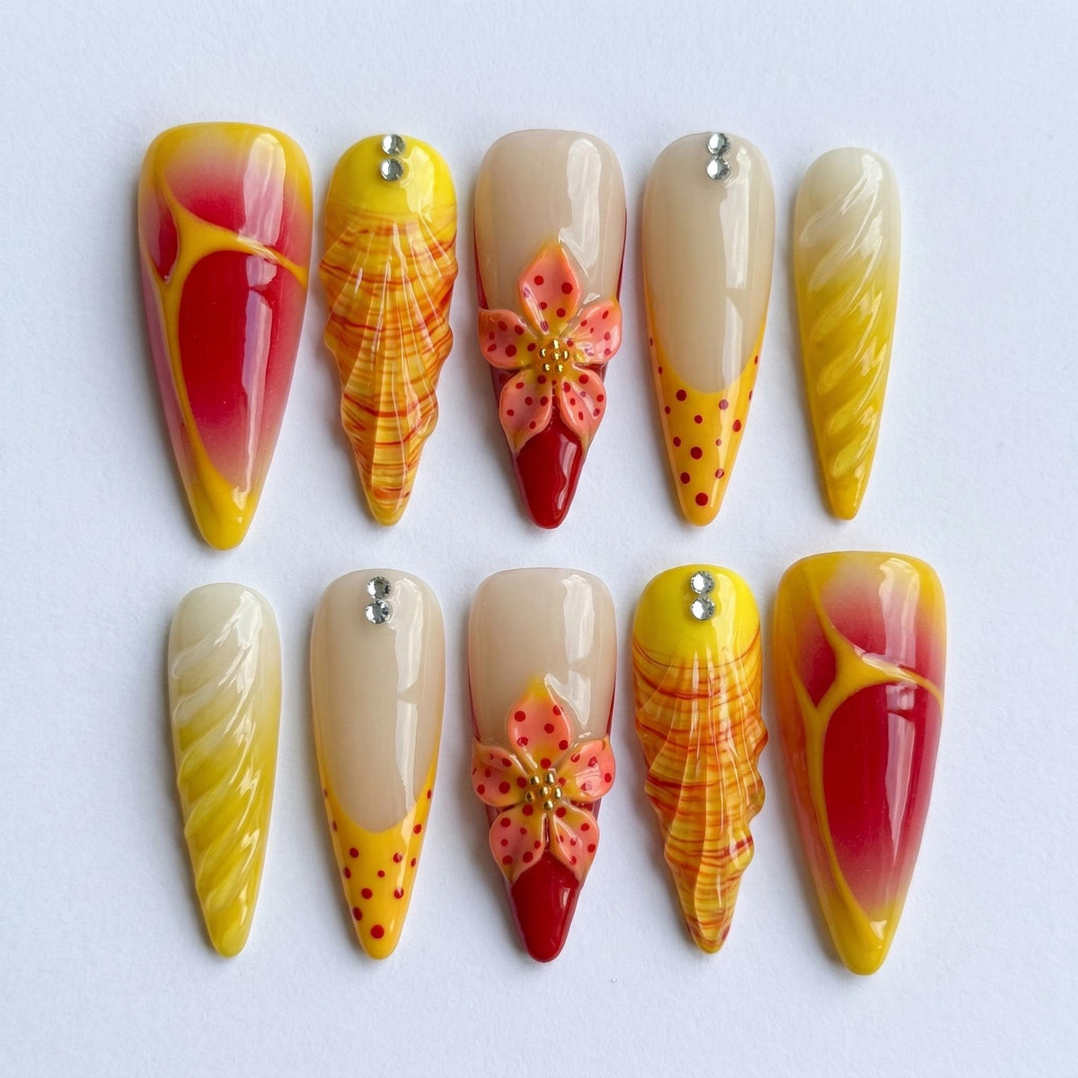 Red and Yellow Summer Tropical Flower Press-On Nails with Plaid, Marble, and Rhinestone Details