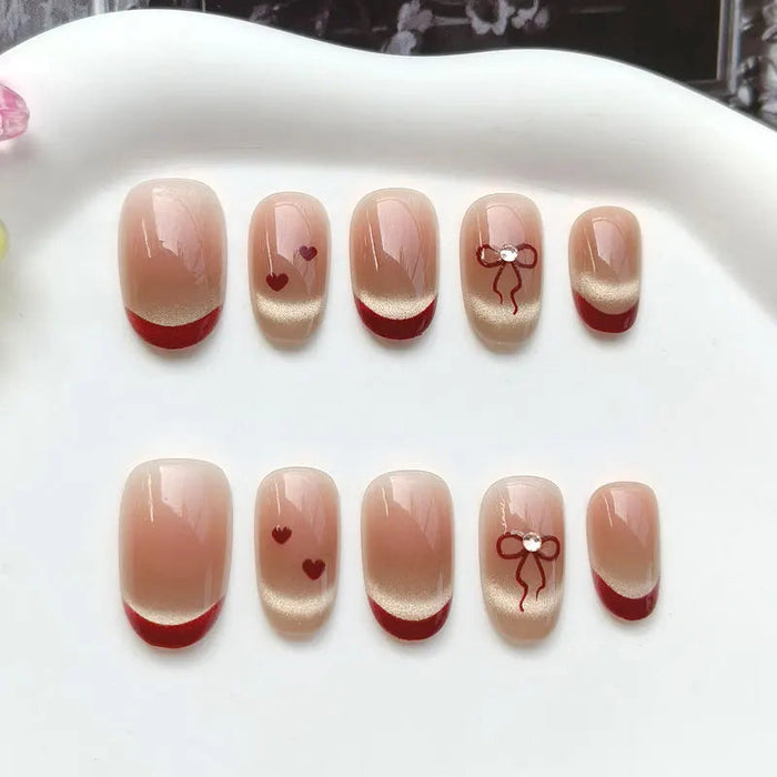 Red French Tip Press On Nails with Gold Shimmer, Hearts and Rhinestone Bows
