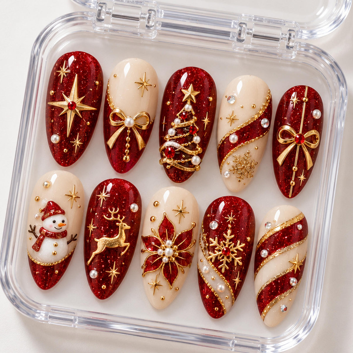 Red Glitter and Ivory Christmas Nails With Gold Bows, Trees, and Winter Motifs