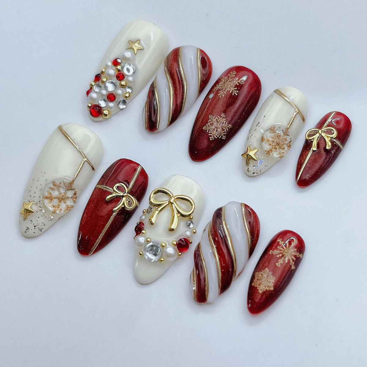 Red, Ivory & Gold Christmas Nails with Bows, Snowflakes and Rhinestones