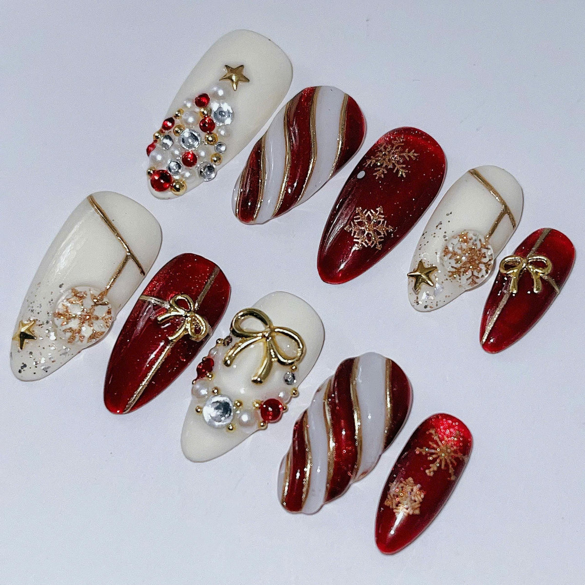 Red, Ivory & Gold Christmas Nails with Bows, Snowflakes and Rhinestones
