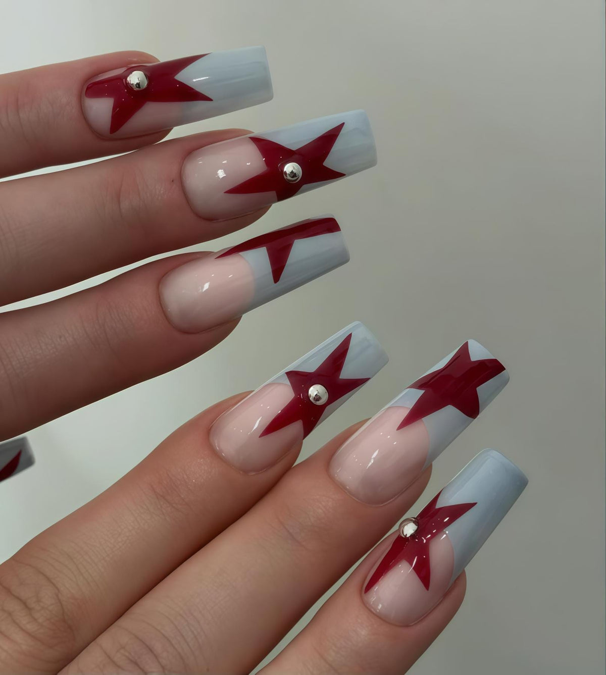 Red Star French Tip Nail Set with Rhinestone Accents