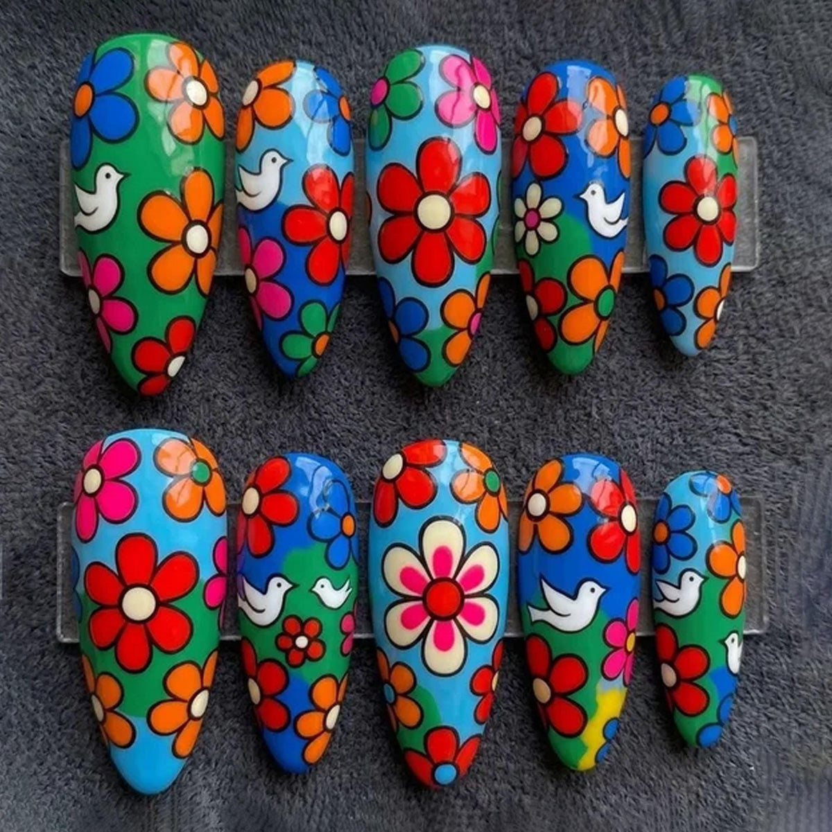 Retro Flower Power Nails With Multicolored Daisies and White Birds