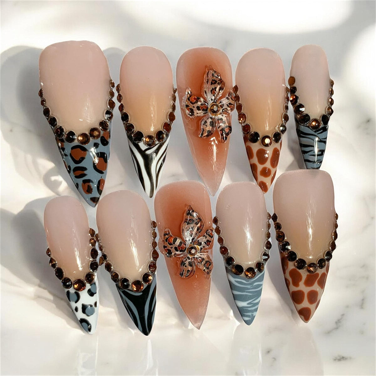 Safari Animal Print Nails with Rhinestone Borders and Raised Details