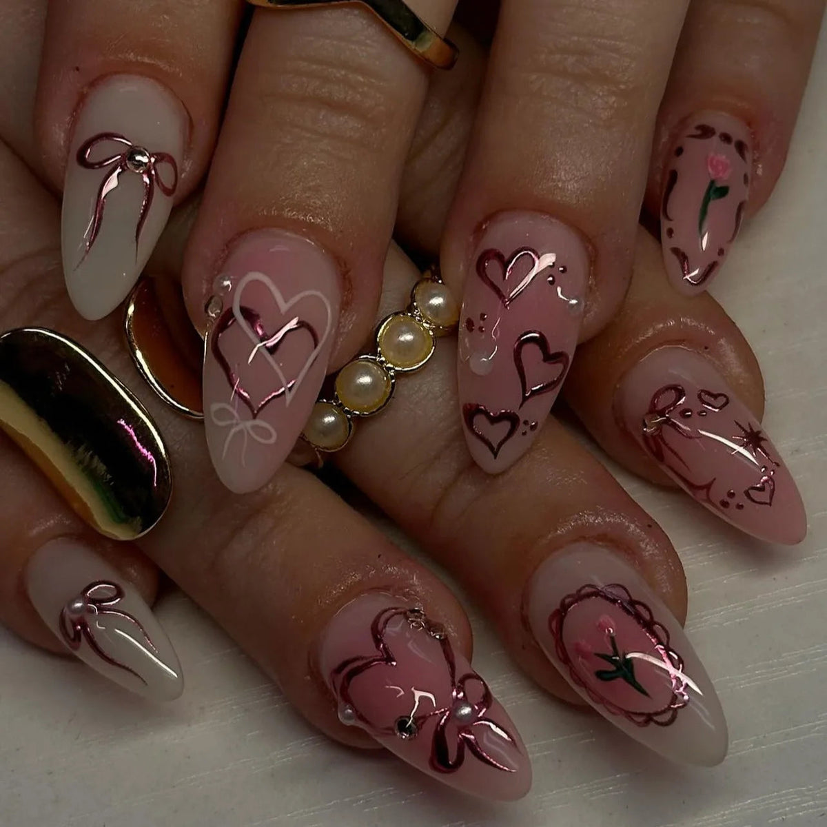 Sheer Blush Nails with Wine Hearts, Bows, Flowers and Swirls