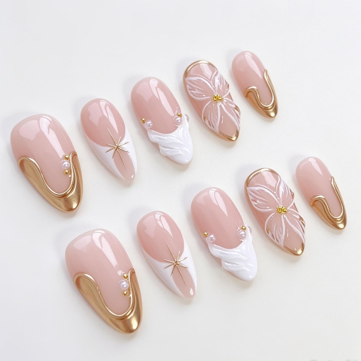 Sheer Blush Pink Bridal Nails With White Flowers, Gold Swirls and Raised Details