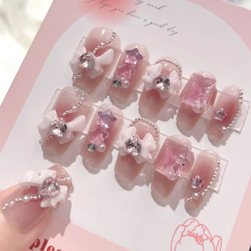 Sheer Blush Pink Nails With 3D White Bows, Pearls and Rhinestones