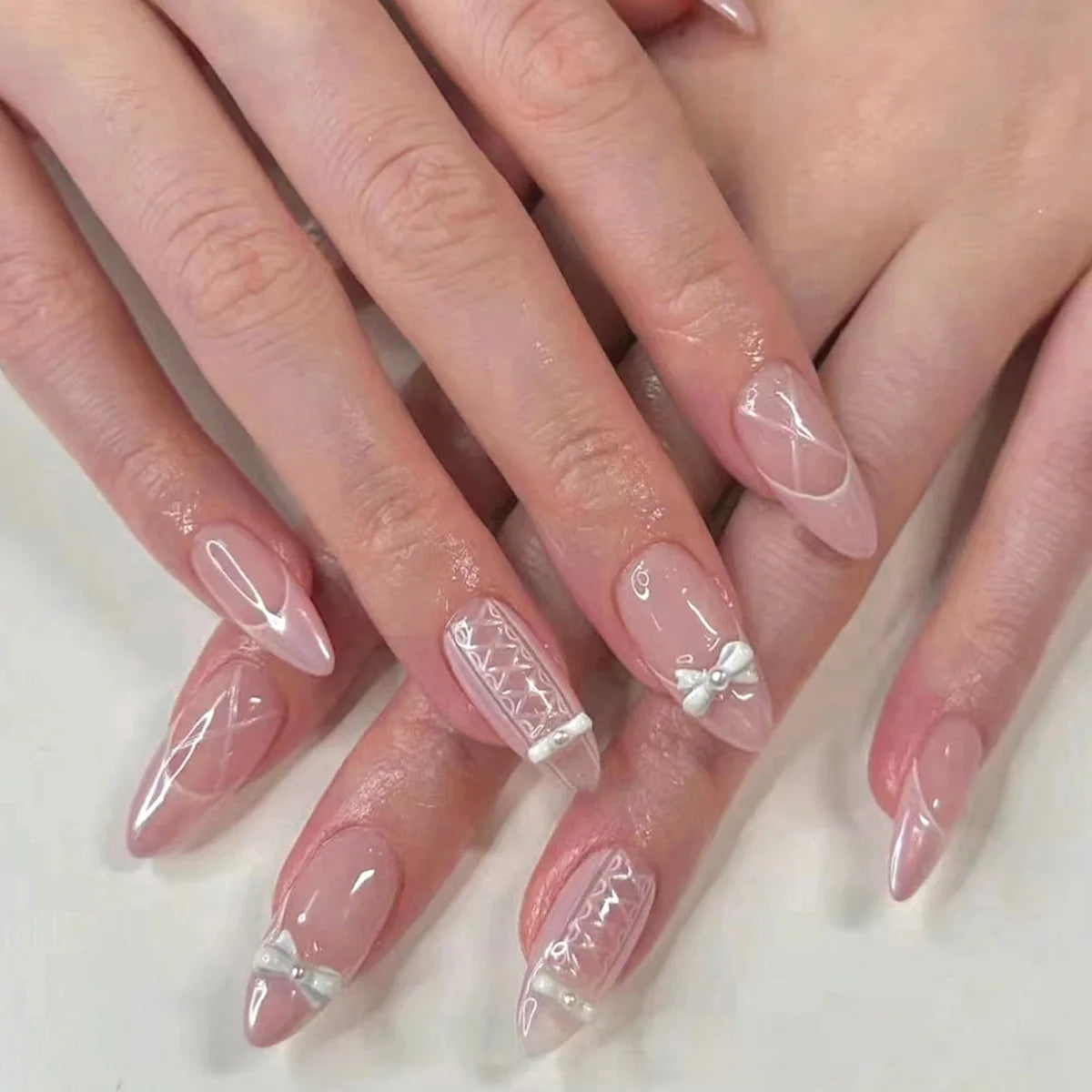 Sheer Blush Pink Nails with White Lace Details and Raised Bows