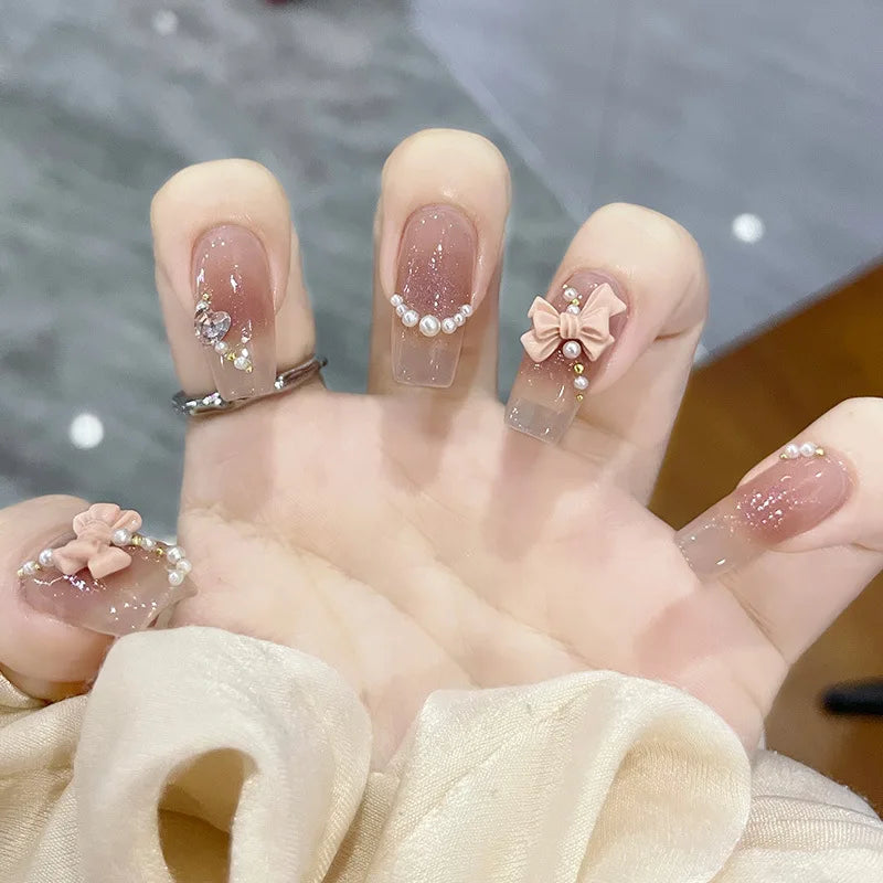 Sheer Blush Pink Press On Nails with Pearl Accents and 3D Bow Charms
