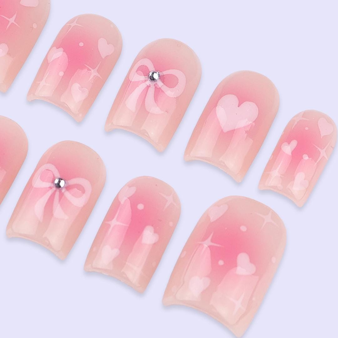 Sheer Blush Pink Valentine Nails with Hearts, Rhinestone Bows & Sparkle