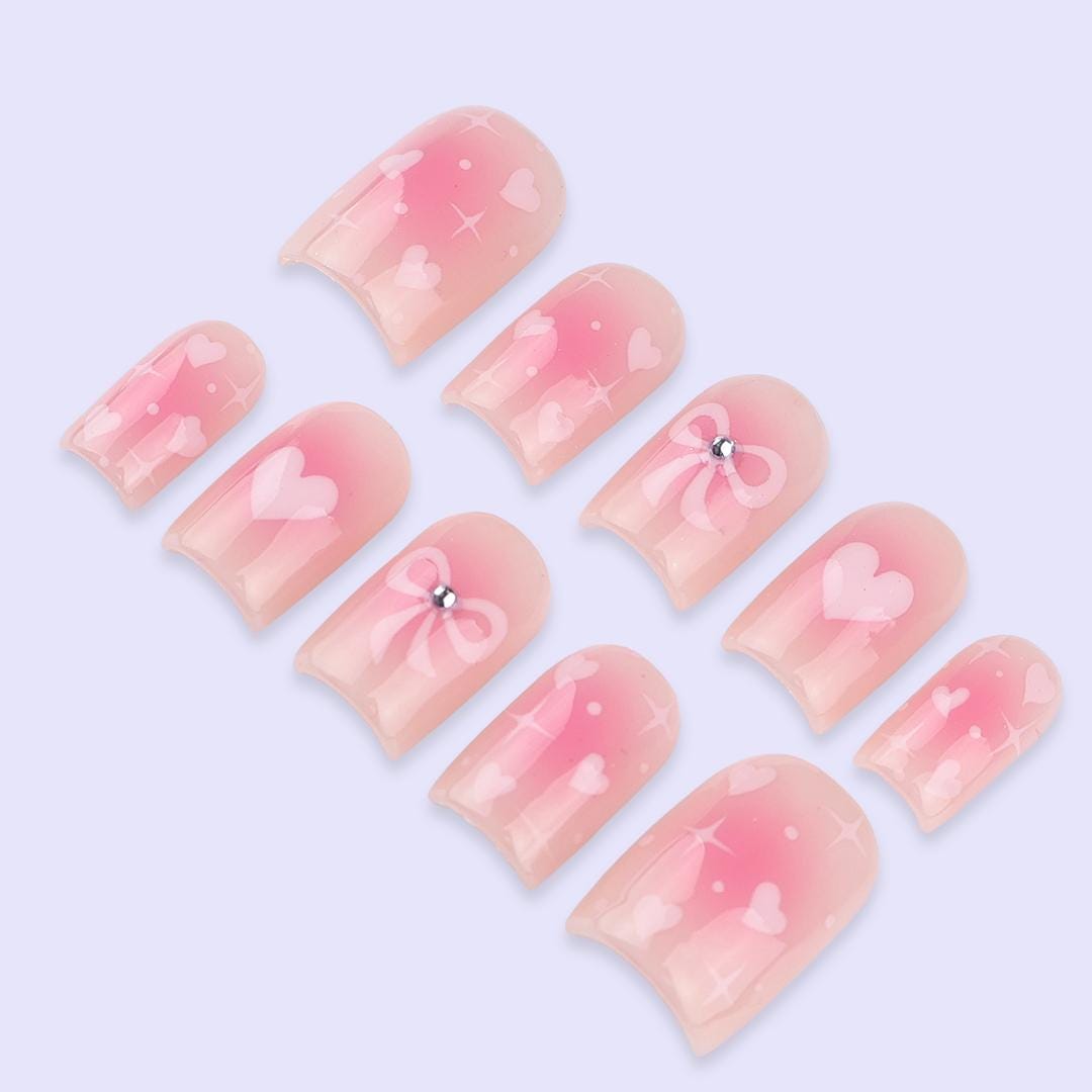 Sheer Blush Pink Valentine Nails with Hearts, Rhinestone Bows & Sparkle