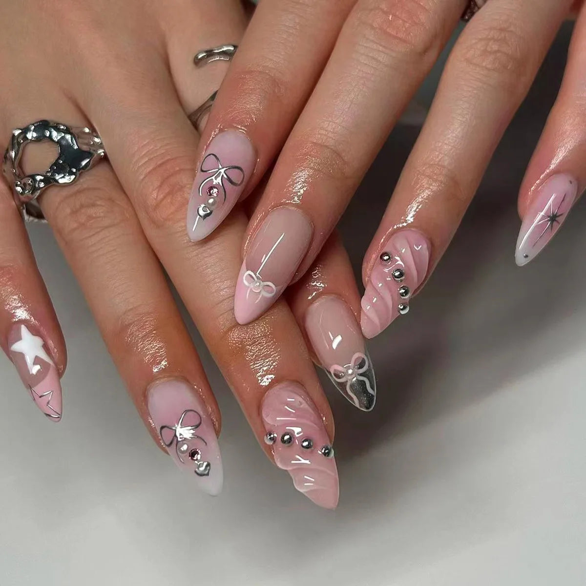 Sheer Nude and Pink Bow Nails with Rhinestones and Fine Line Art