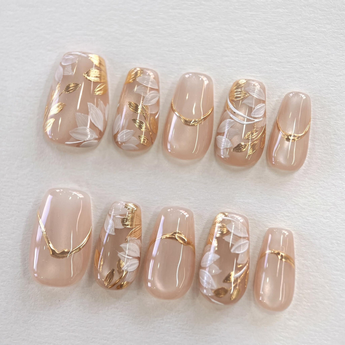 Sheer Nude Floral Bridal Press On Nails with White Petals and Gold Leaf Details
