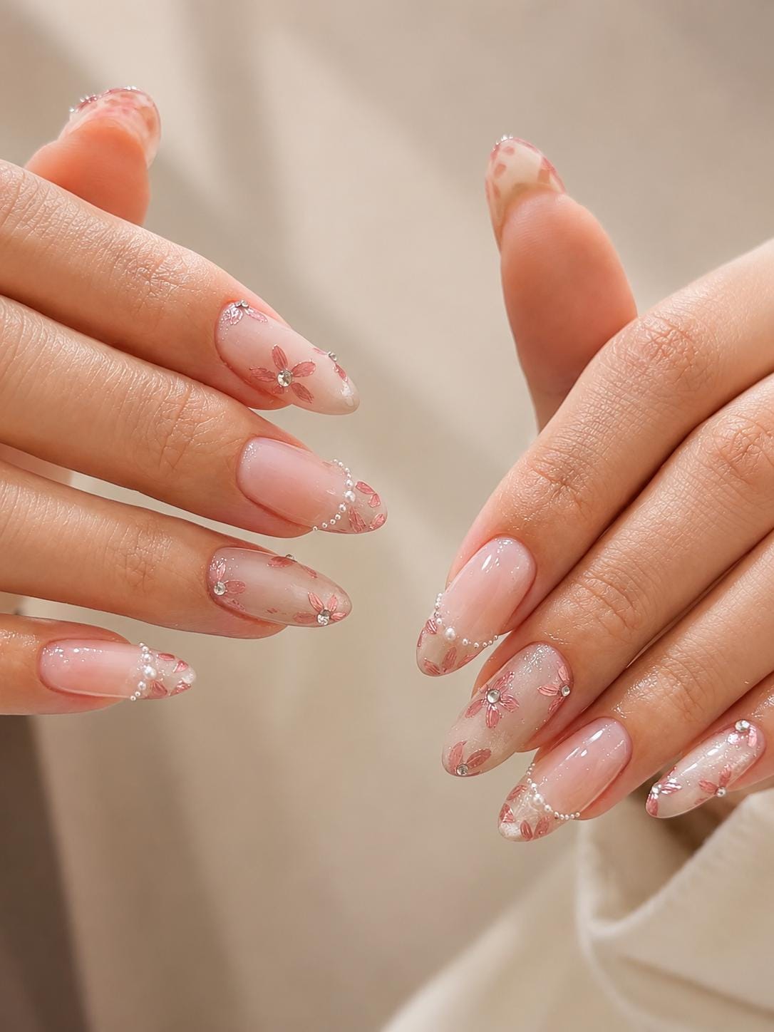Sheer Nude Pink Floral French Tip Nail Set With Gold and Iridescent Accents