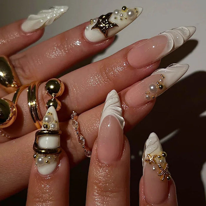 Sheer Nude Pink French Tip Press On Nails with White Swirls, Gold Charms and Pearls