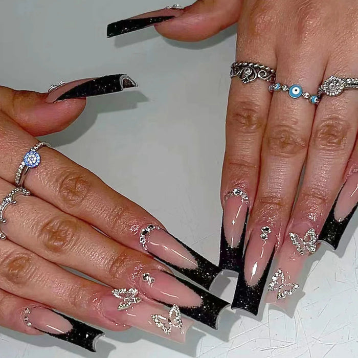 Sheer Nude Pink French Tip Press On Nails With Black Tips and Silver Charms