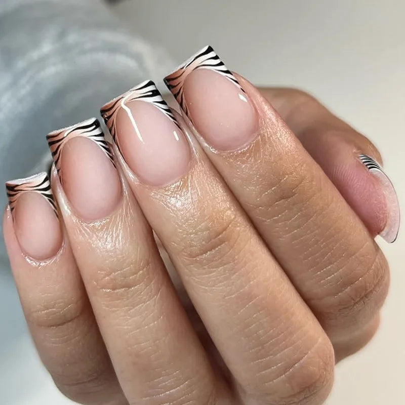 Sheer Nude Pink Nails with Black and White Wavy French Tips