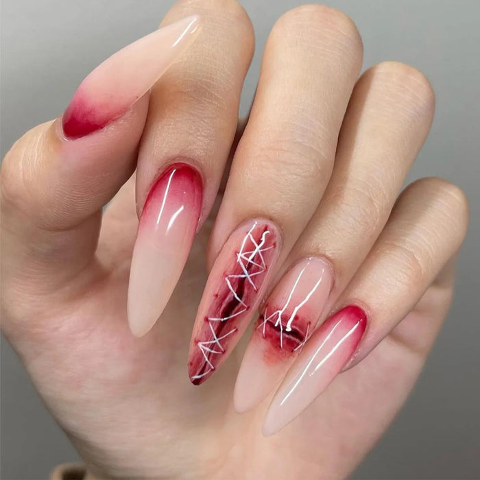 Sheer Nude Pink Press On Nails with Red Cuticle Accents and Abstract Marbling