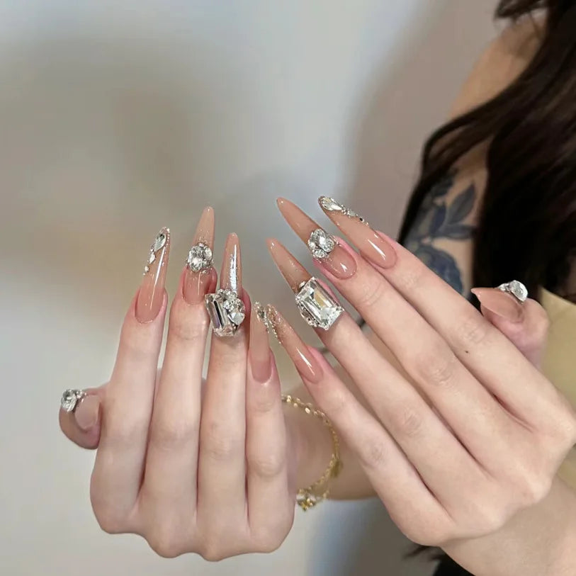 Sheer Nude Pink Nails With Silver Glitter French Tips and Rhinestones