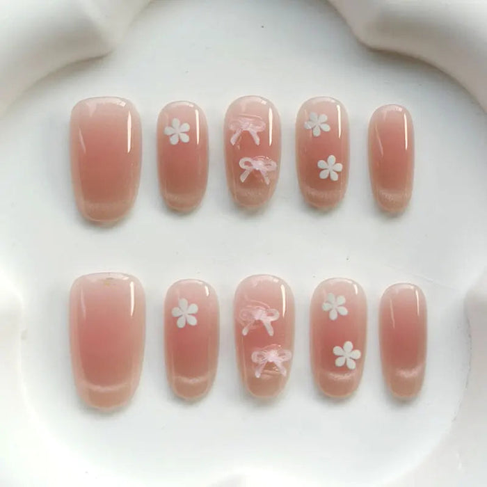 Sheer Nude Pink Press On Nails with White Flowers and Pink Bows