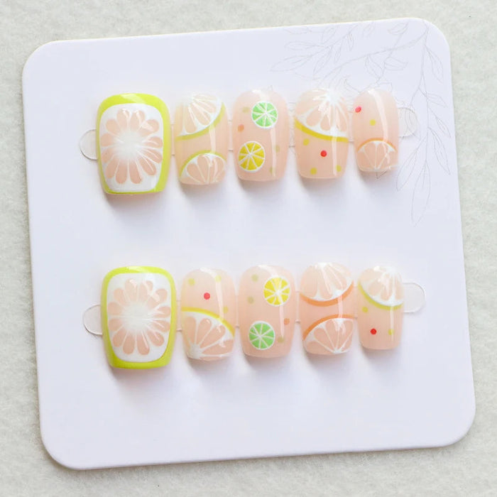 Sheer Peach Nude Press On Nails With Colorful Citrus Slices and Dots