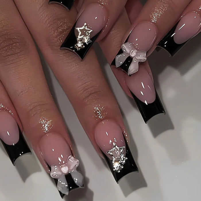 Sheer Pink and Black French Tip Press On Nails With Silver Stars and 3D Bows