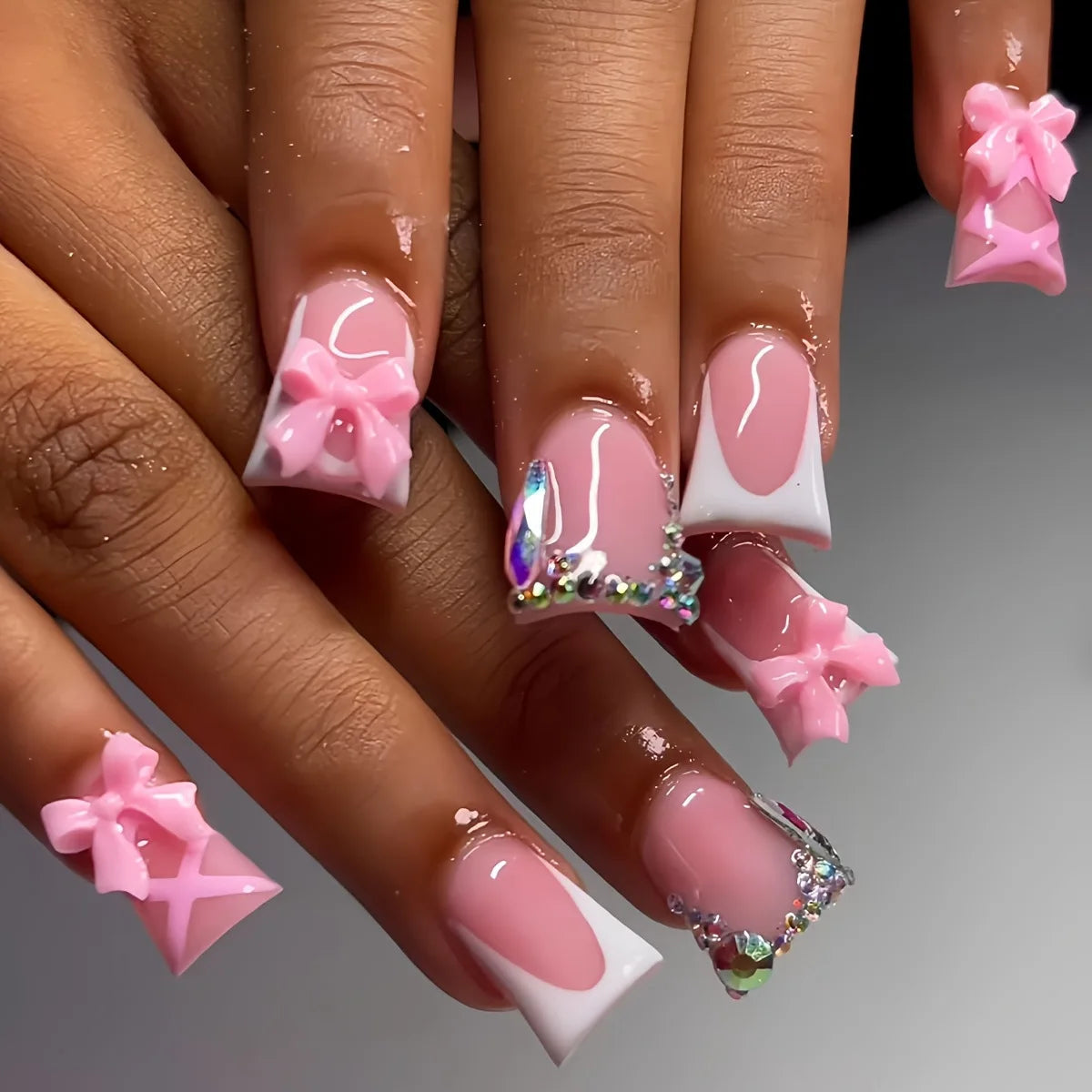 Sheer Pink French Tip Nail Set with 3D Bows and Rhinestone Clusters