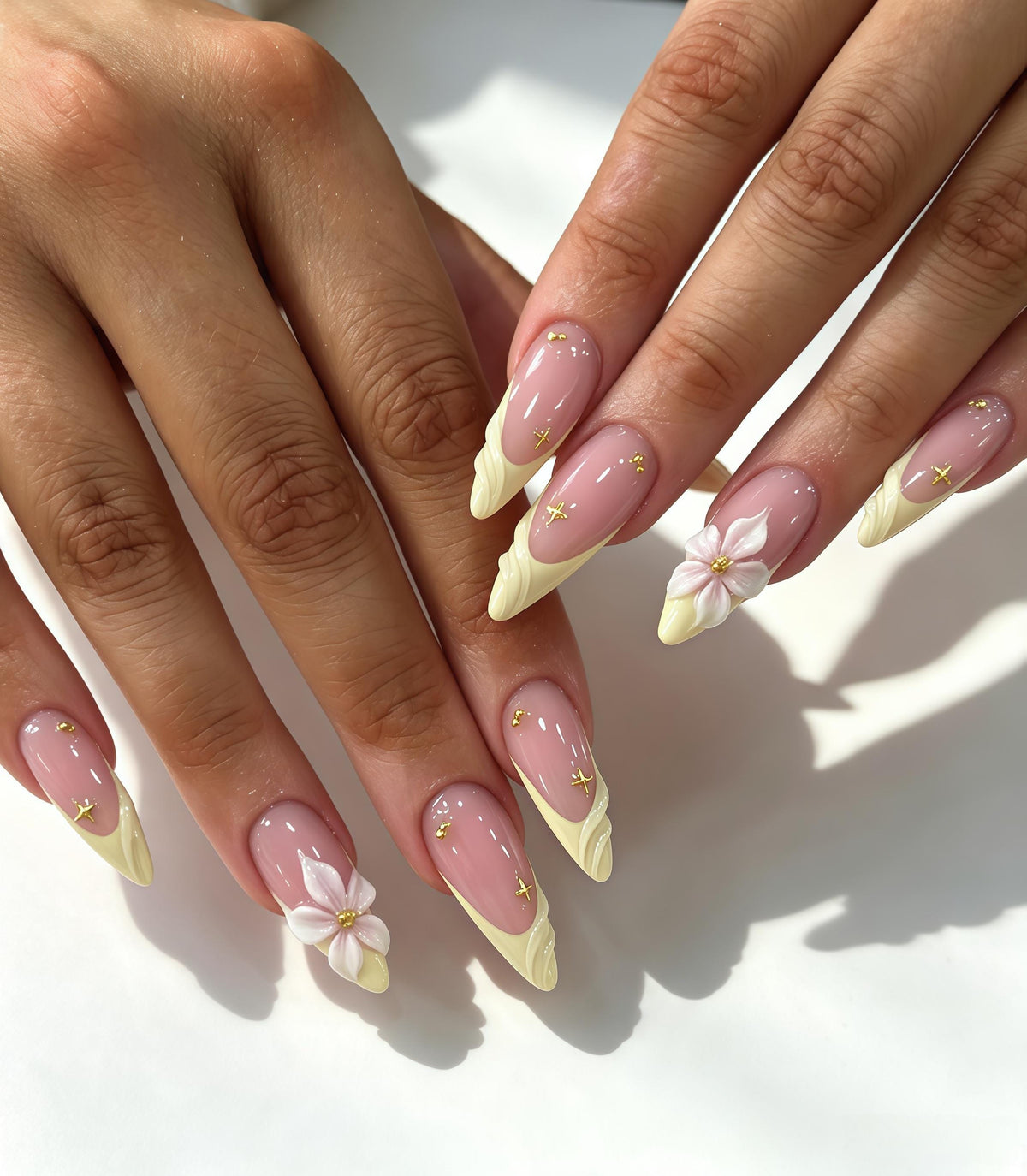 Sheer Pink French Tip Nail Set With Cream Yellow Tips, 3D White Flowers and Gold Accents for Weddings and Parties
