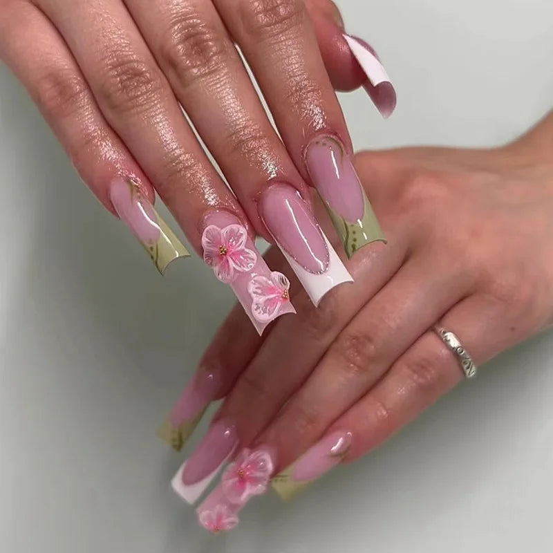 Sheer Pink French Tip Nails With 3D Flowers and Pale Green Accents