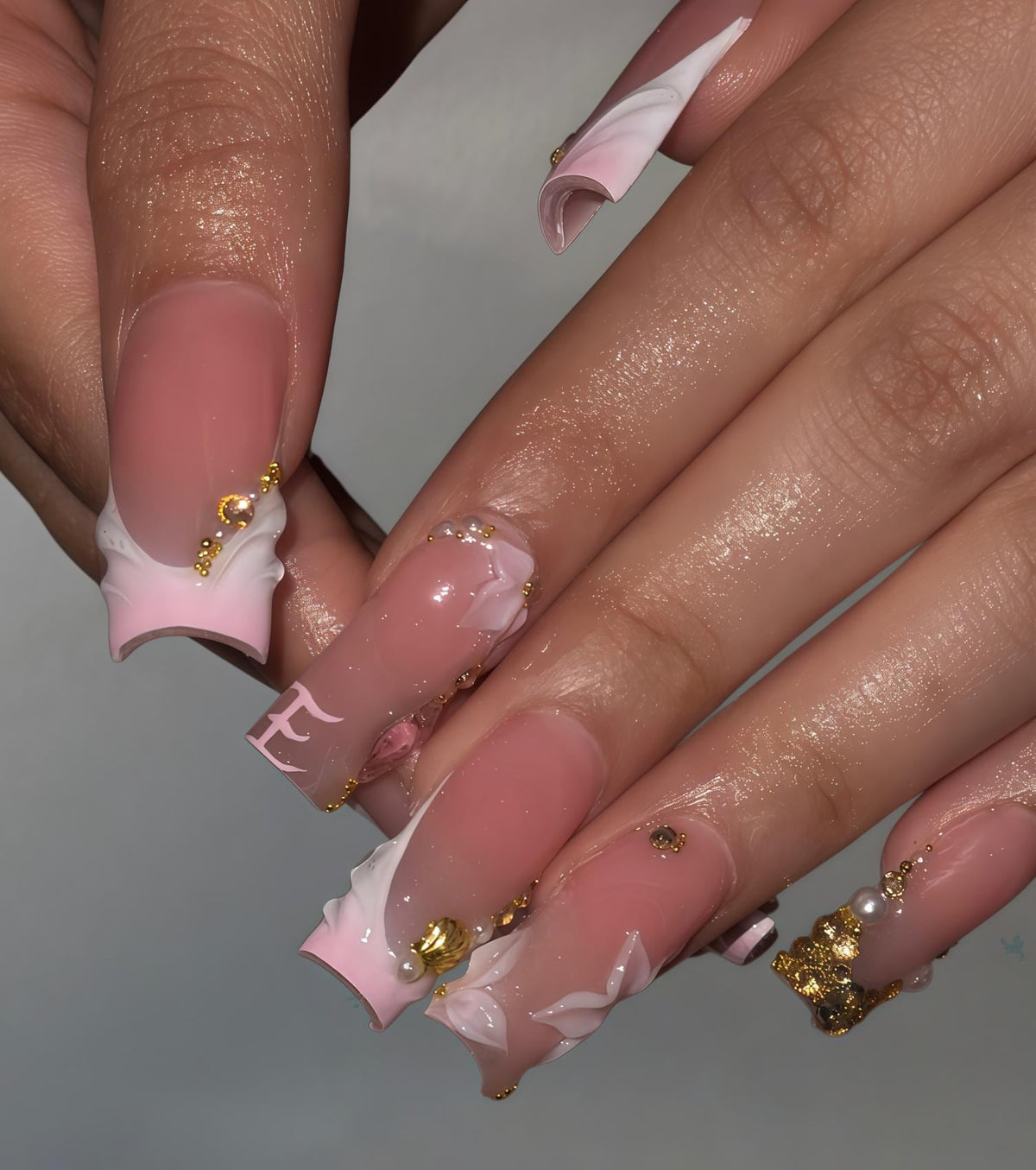Sheer Pink French Tip Nails with 3D Flowers, Gold Beads and Charms