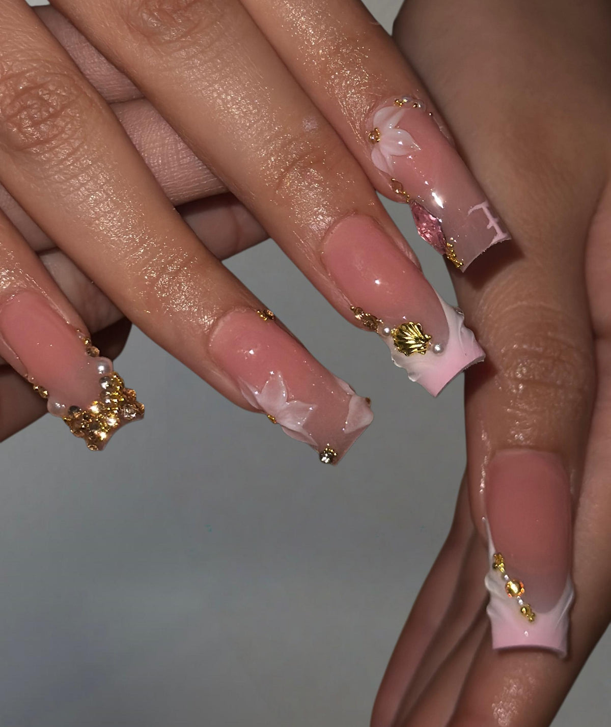 Sheer Pink French Tip Nails with 3D Flowers, Gold Beads and Charms