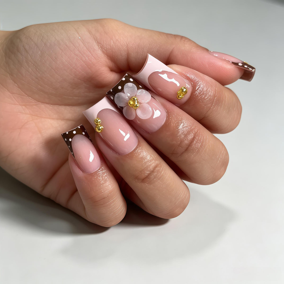 Sheer Pink French Tip Nails with Brown Polka Dots, 3D Flowers and Gold Beads