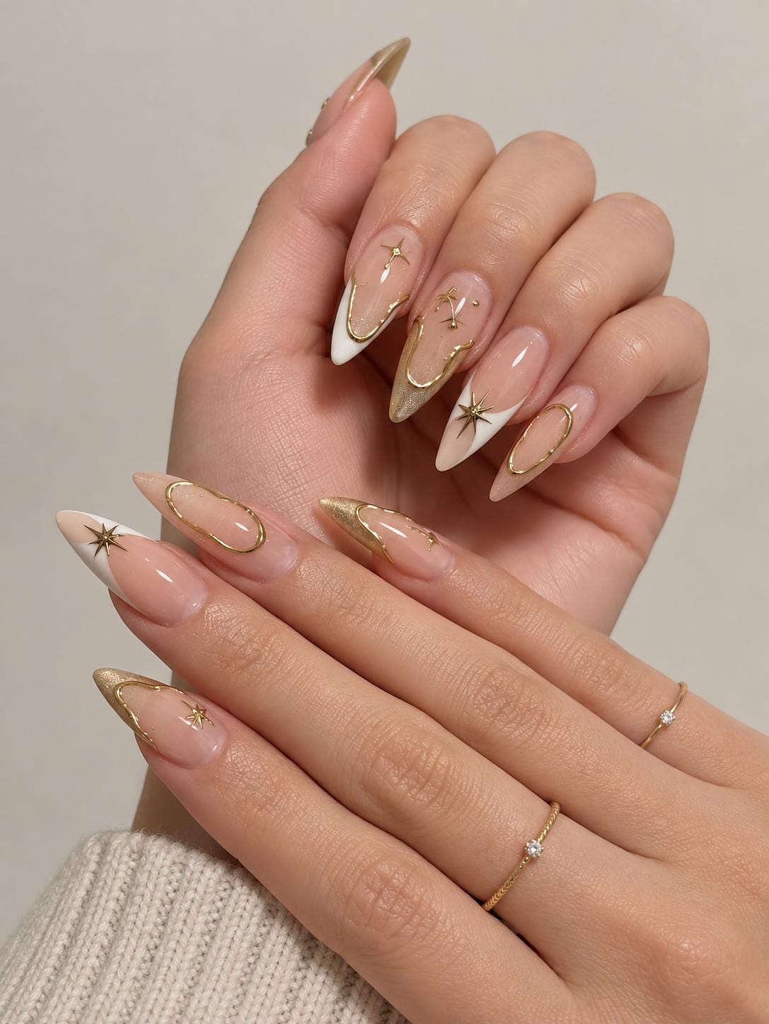 Sheer Pink French Tip Nails with Gold Celestial Accents