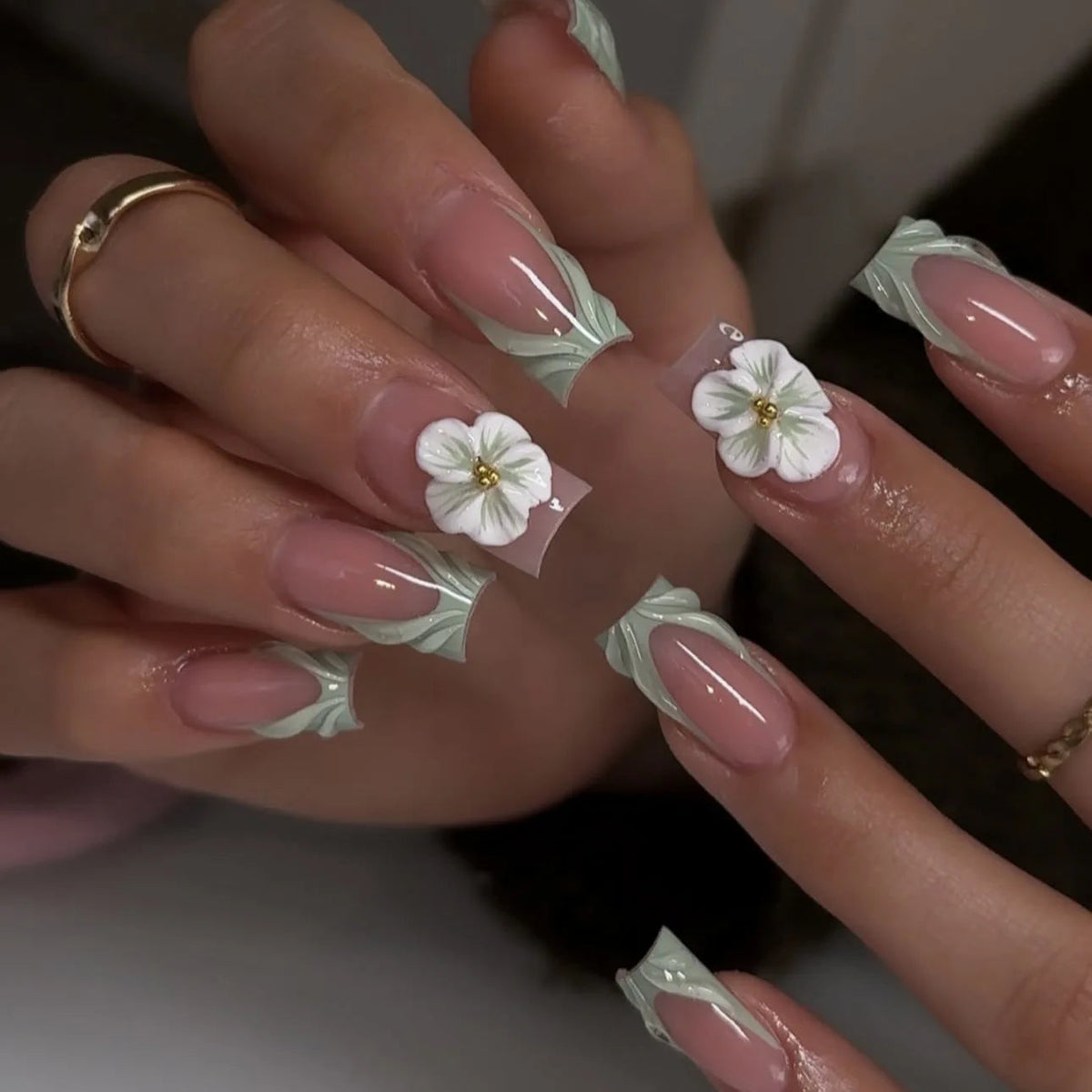 Sheer Pink French Tip Nails with Mint Leaf Accents and Raised White Flowers