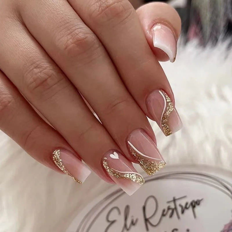 Sheer Pink French Tip Press On Nails With Gold Glitter Swirls